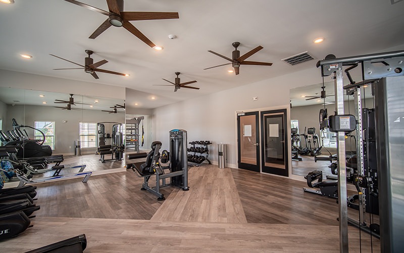 fitness center with large mirrors