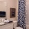 bathroom with a large mirror and ample lighting